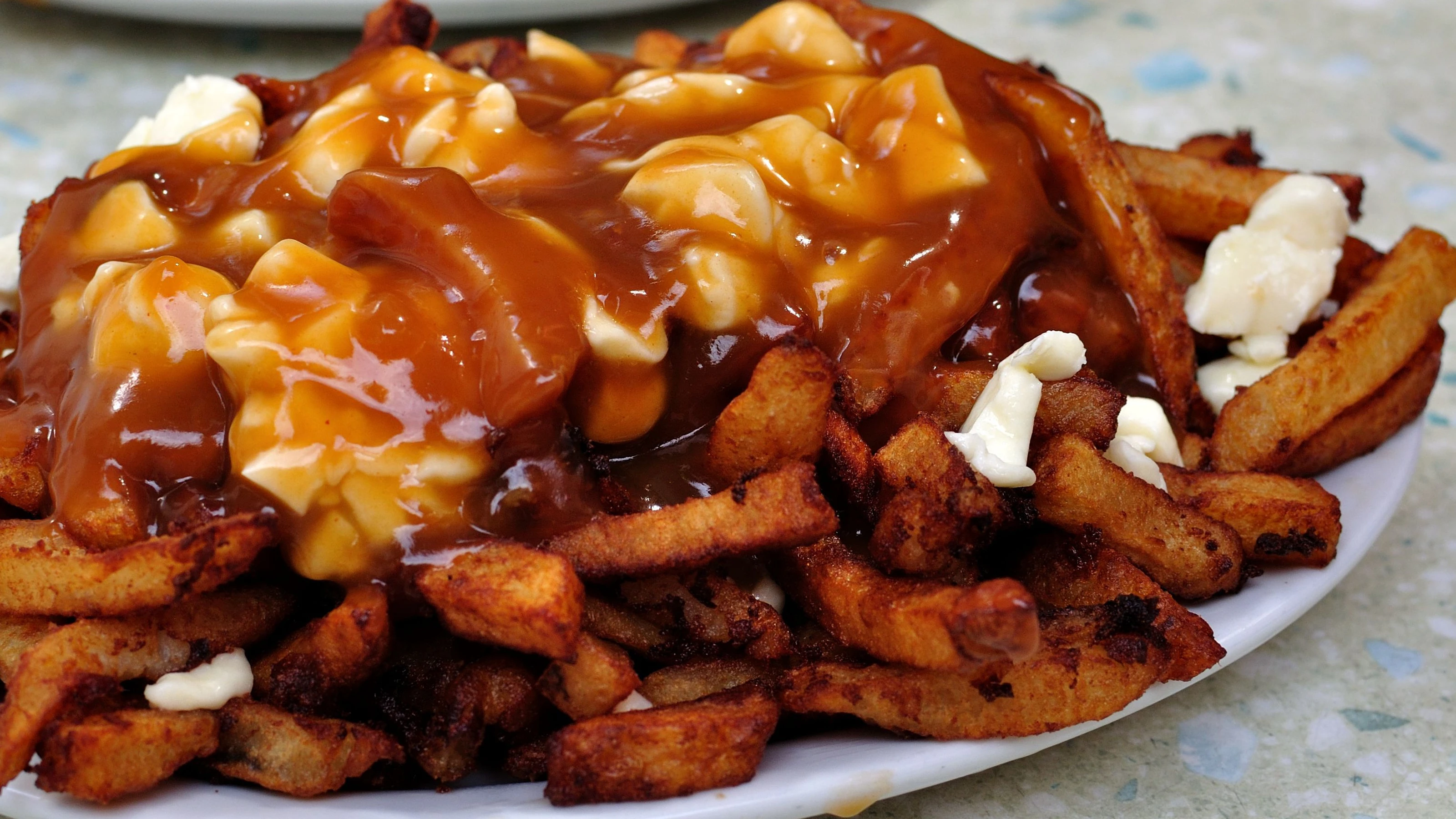 poutine-ricetta-mindthetrip