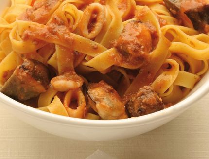 Tagliatelle pasta with seafood and pore mushrooms, Tuscany, Italy