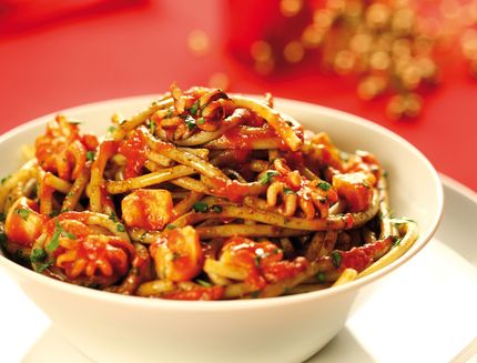 Bigoli pasta with tomato sauce and cuttlefishes, Italy