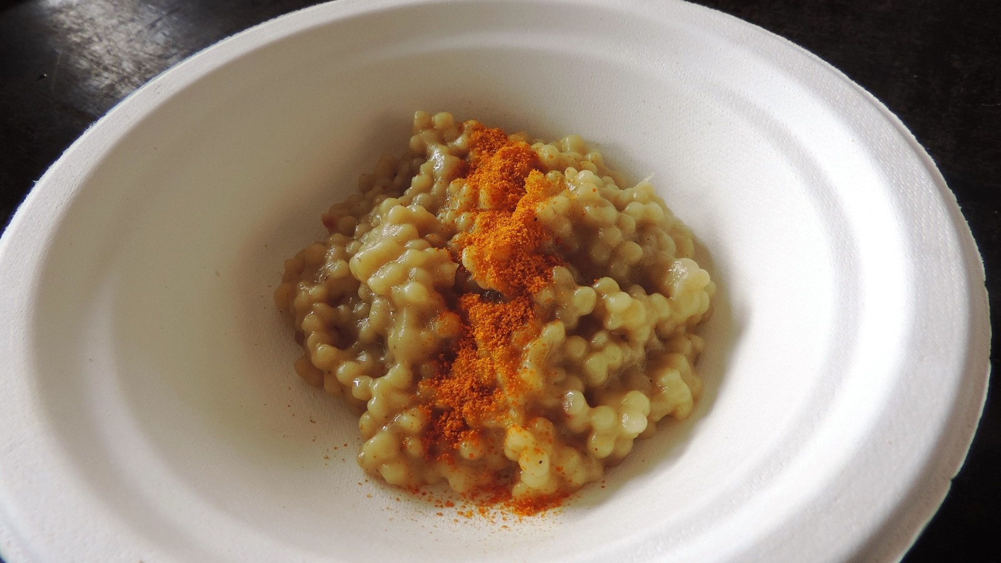 la fregola burro acciughe e polvere di scorza d'arancia di Riccardo Di Giacinto - All'Oro
